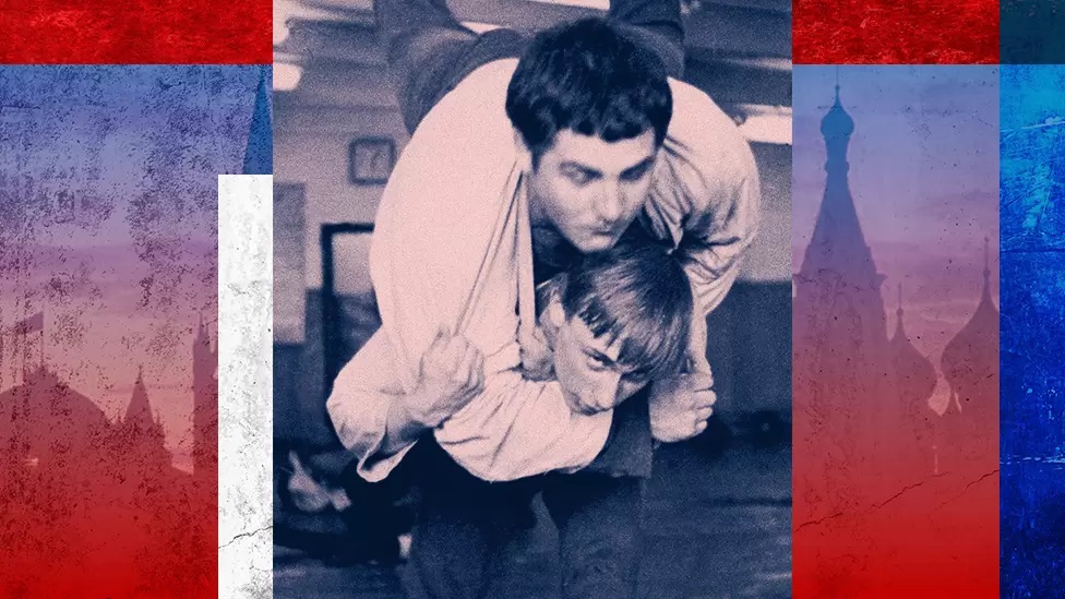 Vladimir Putin (bottom) wrestles with a classmate in St Petersburg in 1971