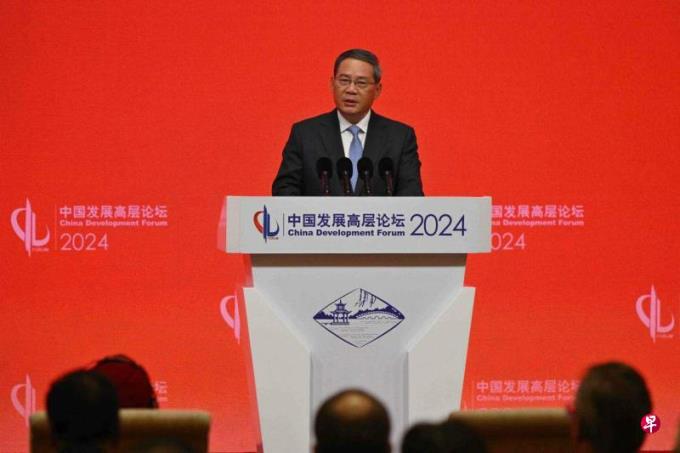 李强承诺以更高水平开放链接世界